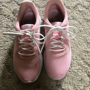 Pink and white Nikes